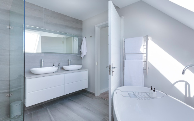 a spacious modern bathroom with quality accessories